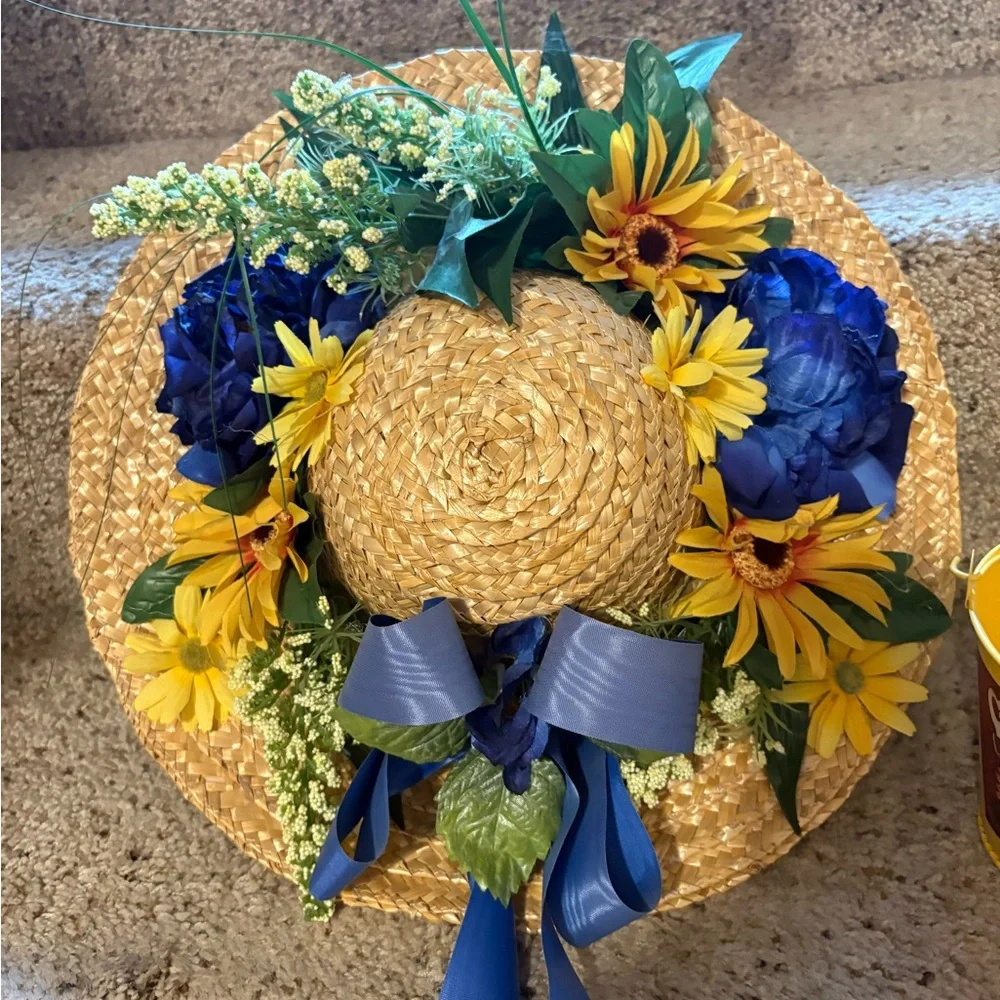 Pretty vintage sunflower straw hat with a sunflower bucket.